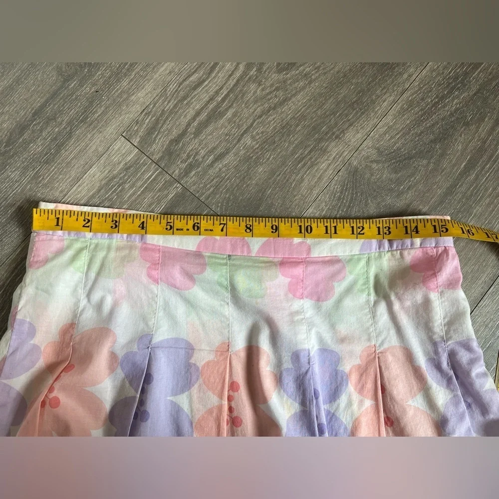 Honey punch pleated pastel floral skirt.